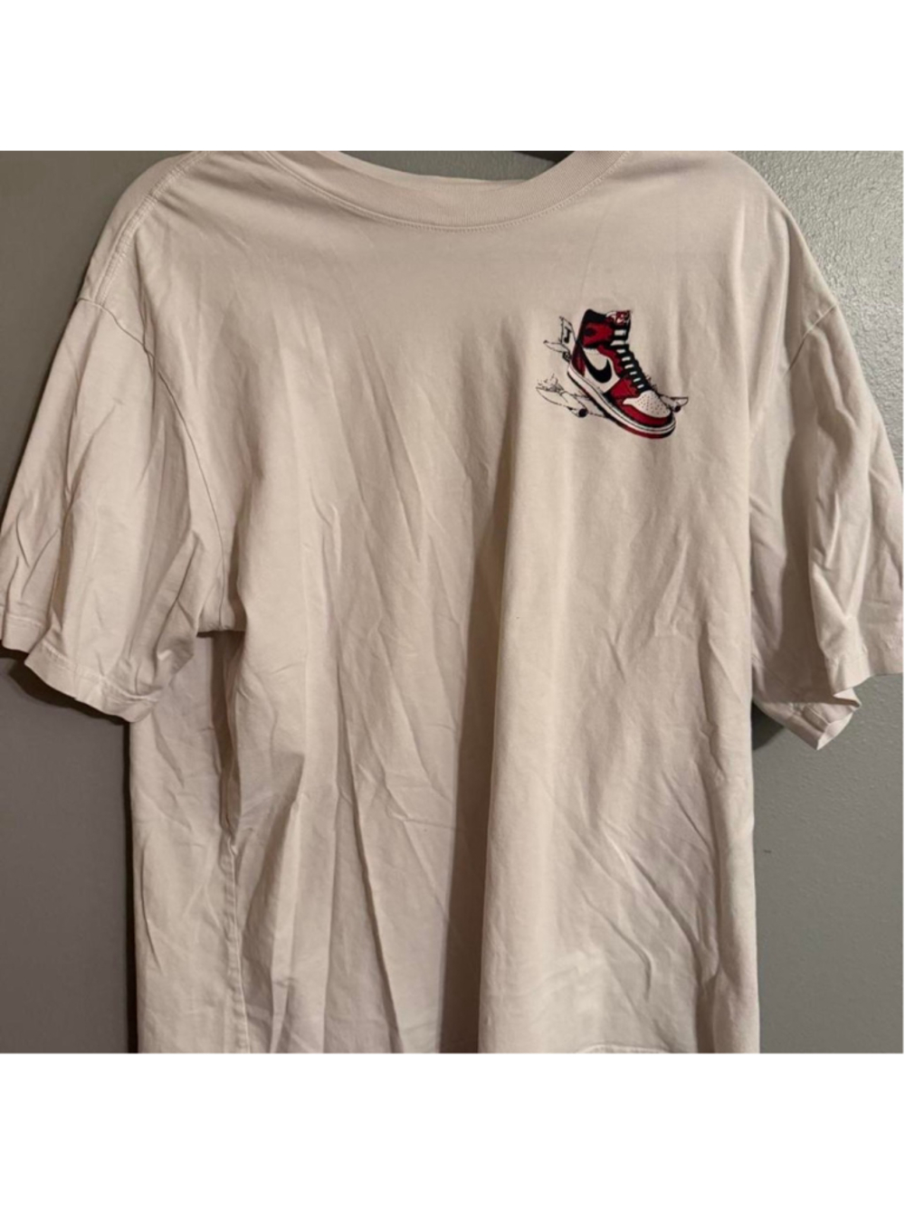 Jordan Brand Air Jordan graphic tee featuring the iconic red/black/white Jordan